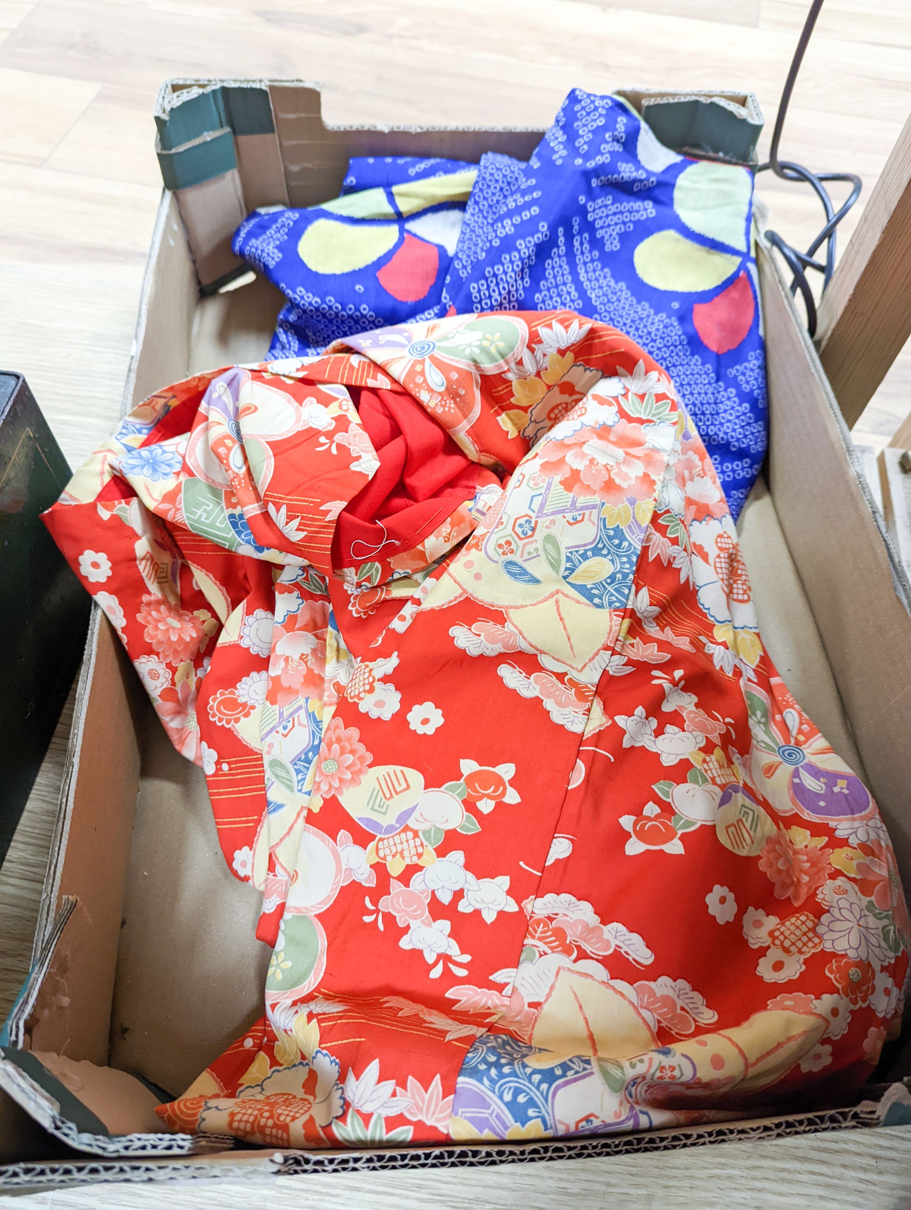A multi-coloured silk kimono, a floral kimono and a child's silk kimono